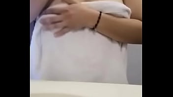 hidden cam: leaked home video of college girl in the bathroom with big tits.